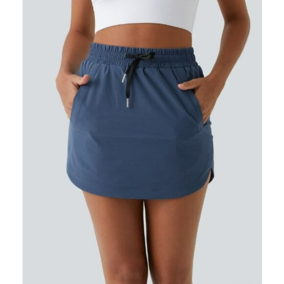 HALARA Dresses & Skirts - High Waisted Drawstring Side Pocket 2-in-1 Curved Hem Mini Golf Skirt